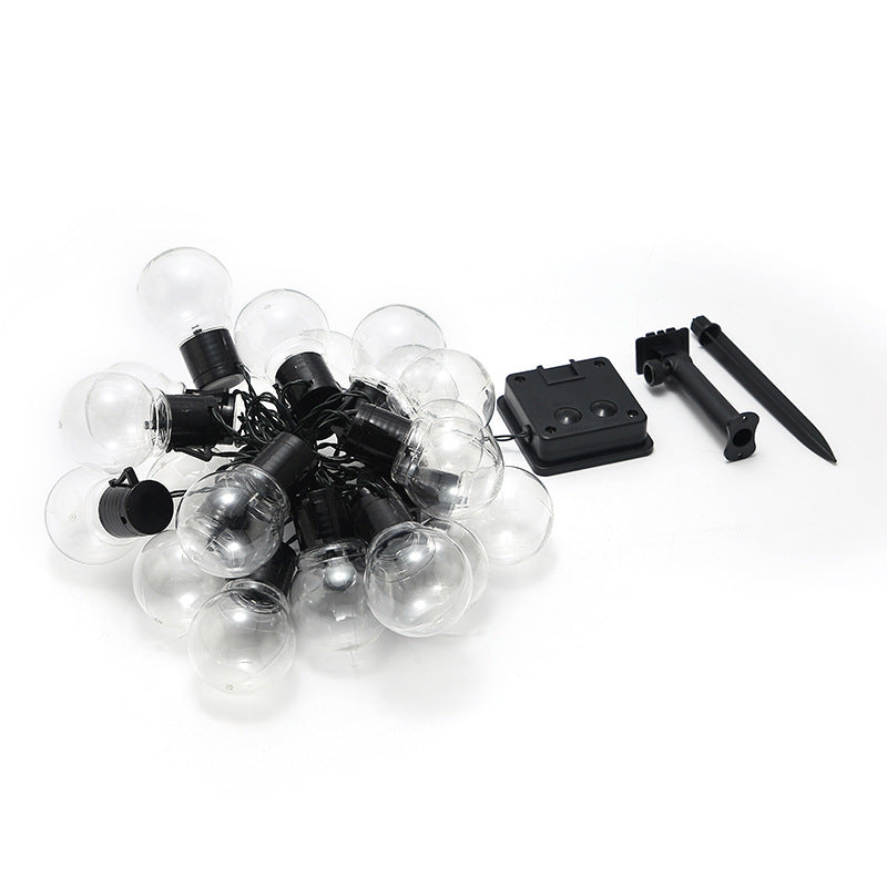 String lights with clear bulbs and black connectors on a white background